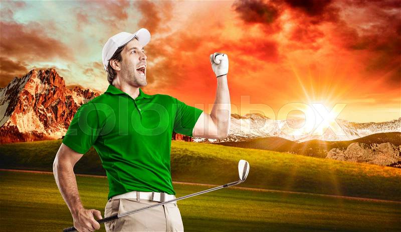 Golf Player in a green shirt celebrating, on a golf course, stock photo