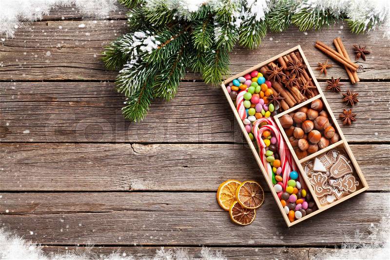 Christmas food decor and gingerbread cookies. Xmas cooking table and fir tree. Top view with copy space for your greetings, stock photo