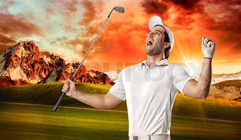 Golf Player in a white shirt celebrating, on a golf course, stock photo