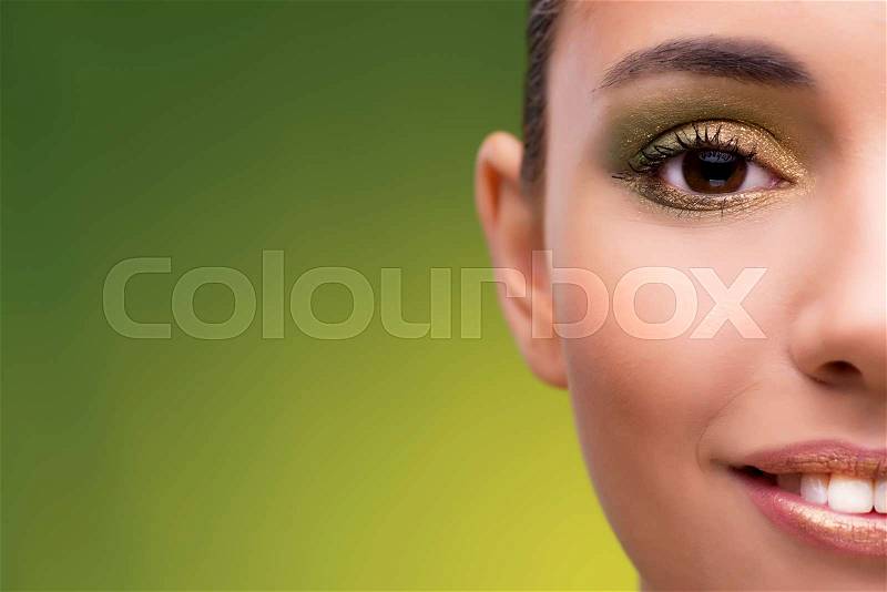 Beautiful woman on green background, stock photo