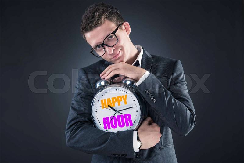 Businessman in happy hour concept, stock photo