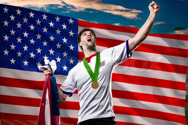 American Athlete Winning a golden medal in front of a american flag, stock photo