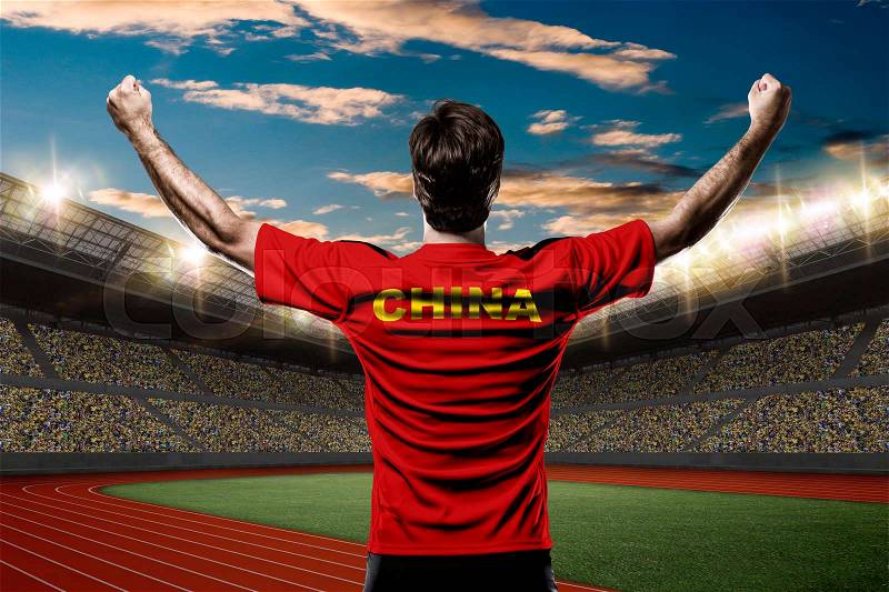 Chinese Athlete Winning a golden medal on a Track and field stadium, stock photo