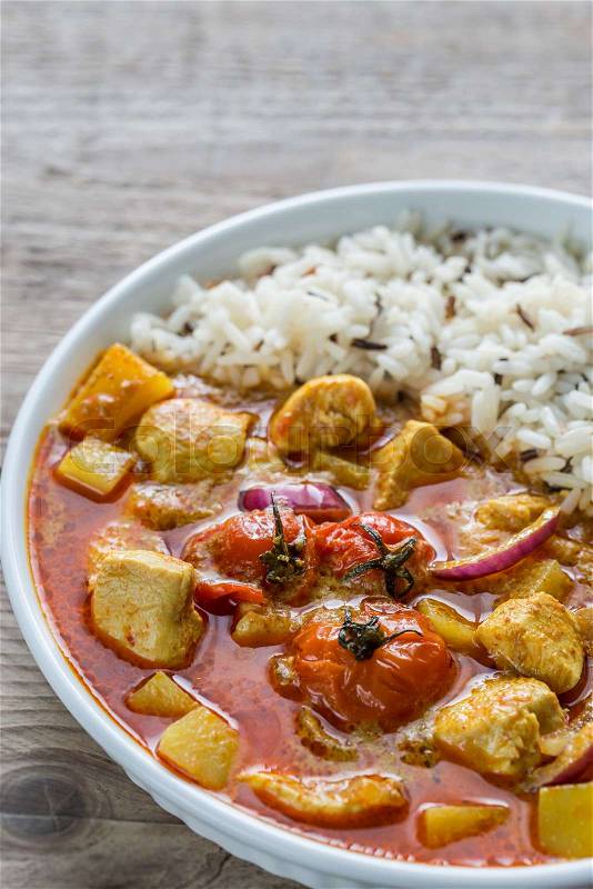 Thai yellow curry with chicken and rice, stock photo