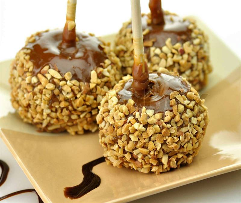 Candy apples with caramel sauce, stock photo