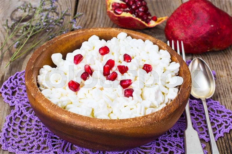 Healthy food. Cottage cheese with pomegranate seeds. Studio Photo, stock photo