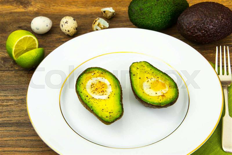 Avocados, Baked with Quail Egg, Salt, Pepper Lemon Studio Photo, stock photo