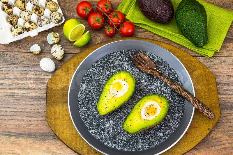Avocados, Baked with Quail Egg, Salt, Pepper Lemon Studio Photo, stock photo