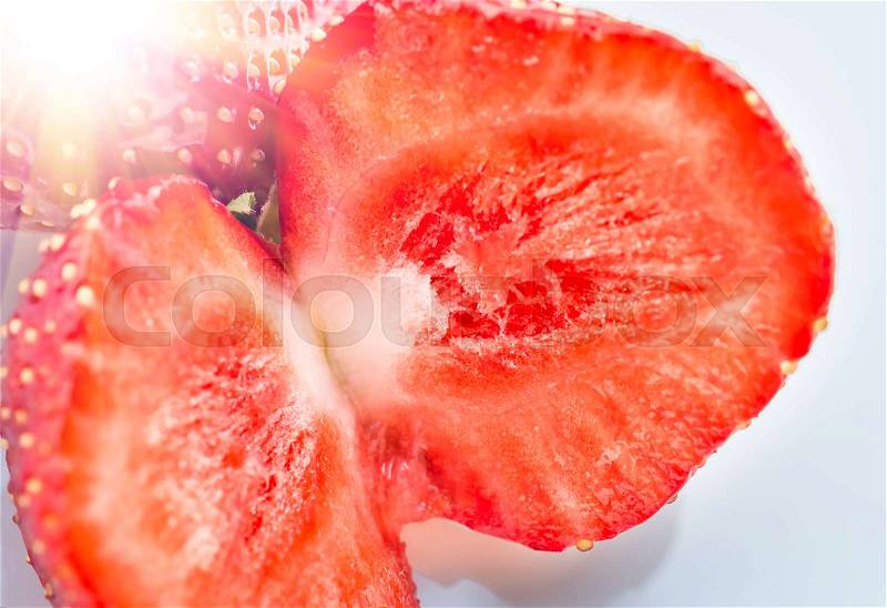 Fresh ripe red strawberries closeup on a white dish, background, stock photo