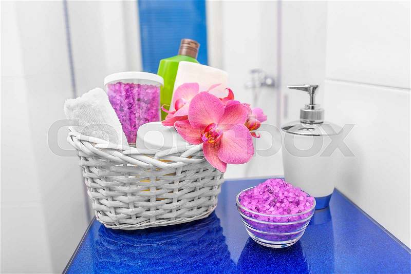 Basket with cosmetics in the bathroom. Still life close-up, stock photo