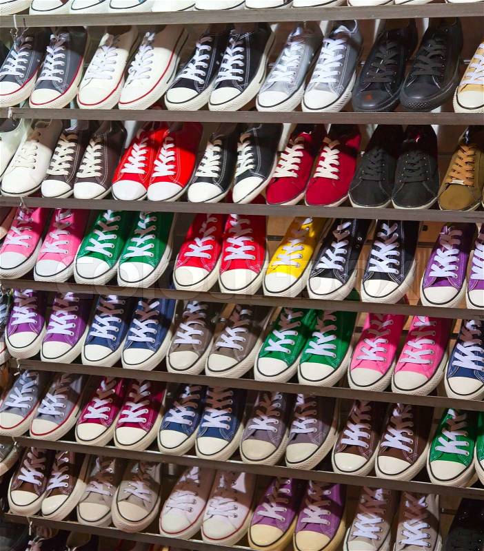 Lots of sneaker shoes on sale, stock photo