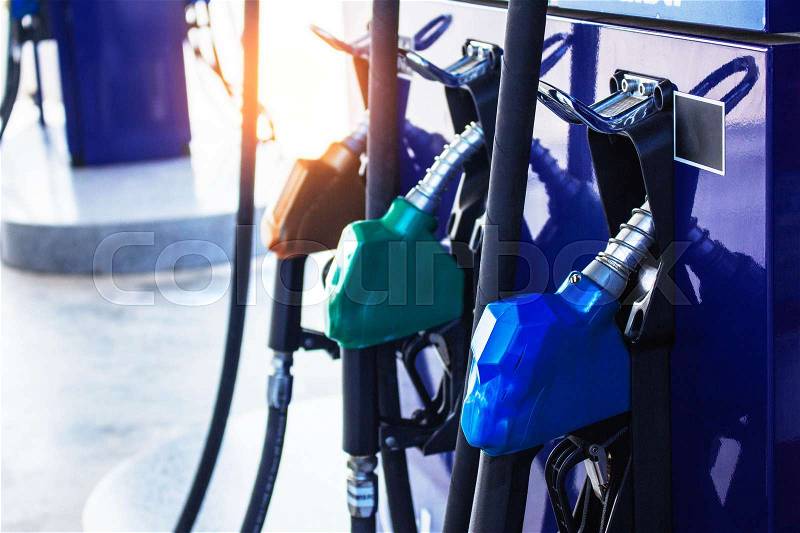 Fuel nozzle on gas station in Thailand, stock photo