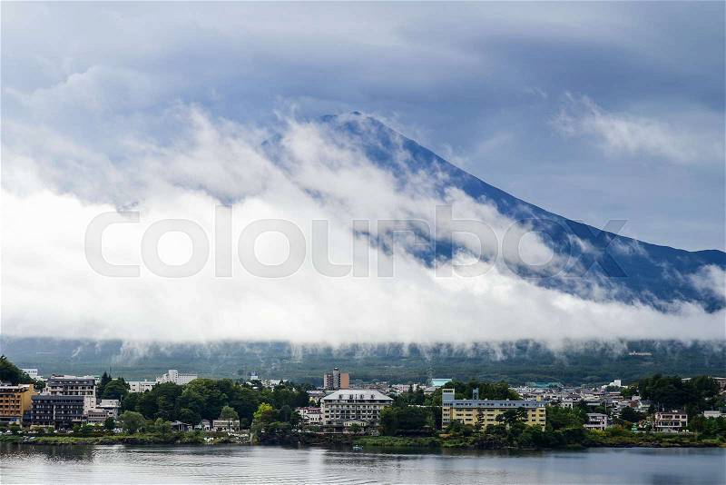 KAWAGUCHIKO, JAPAN - OCTOBER 09, 2016: Landscape at kawaguchiko lake of Japan with many hotel and resorts for tourism. Mt. Fuji background, stock photo