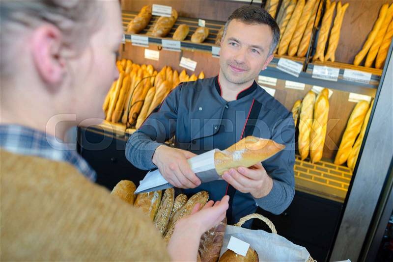 Buying the baguette, stock photo