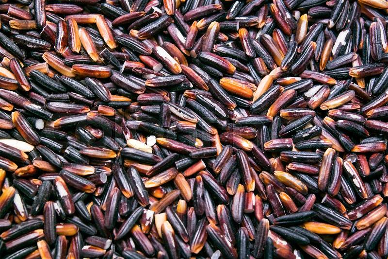 Black rice background, texture, stock photo