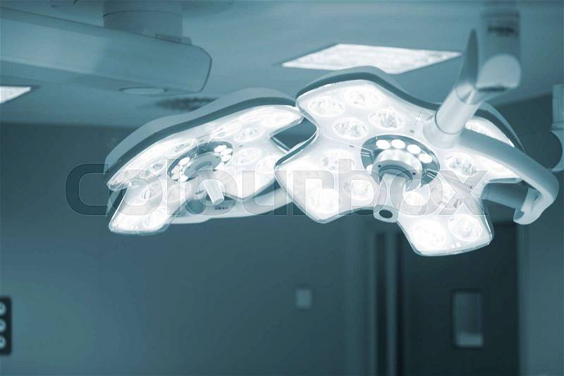 Operating emergency room surgery theater lighting in hospital to enable surgeon to see well in operations, stock photo