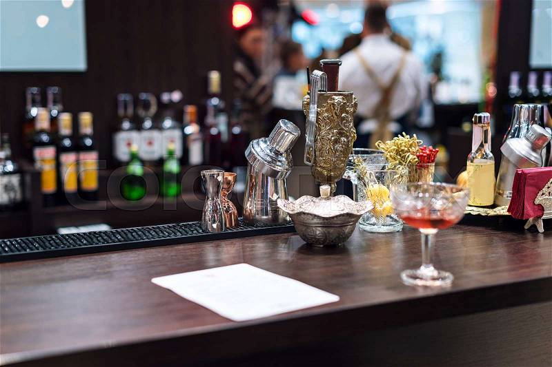 Set of bar accessories and ingredients for making a cocktails on counter, stock photo