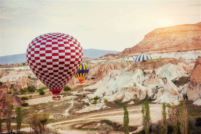 Turkey Cappadocia beautiful balloons flight stone landscape amazing, stock photo