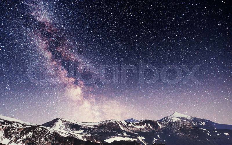 Spring mountain landscape. Fantastic starry sky. Carpathians, Ukraine, Europe, stock photo
