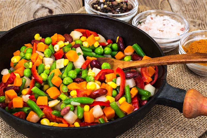 Mexican mixture of vegetables, cooked in a frying pan. Studio Photo, stock photo
