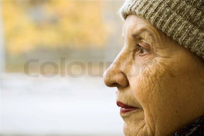 Grandmother, focus point on the eye, stock photo