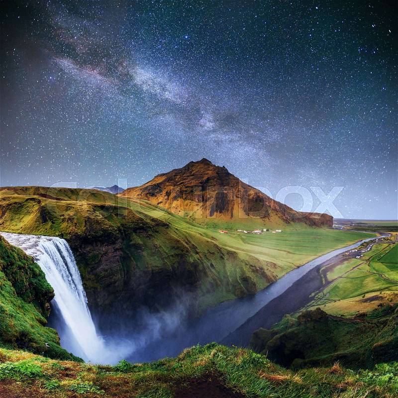 Beautiful waterfall. The starry sky and the Milky Way. Iceland. Europe, stock photo
