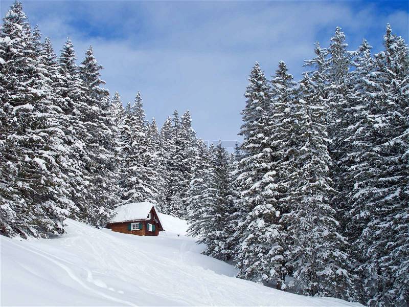 Stock image of 'Winter holiday house in swiss alps'