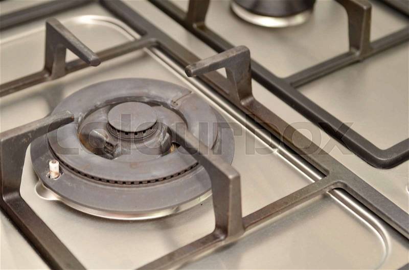 Close up of modern shining metal gas cooker, stock photo