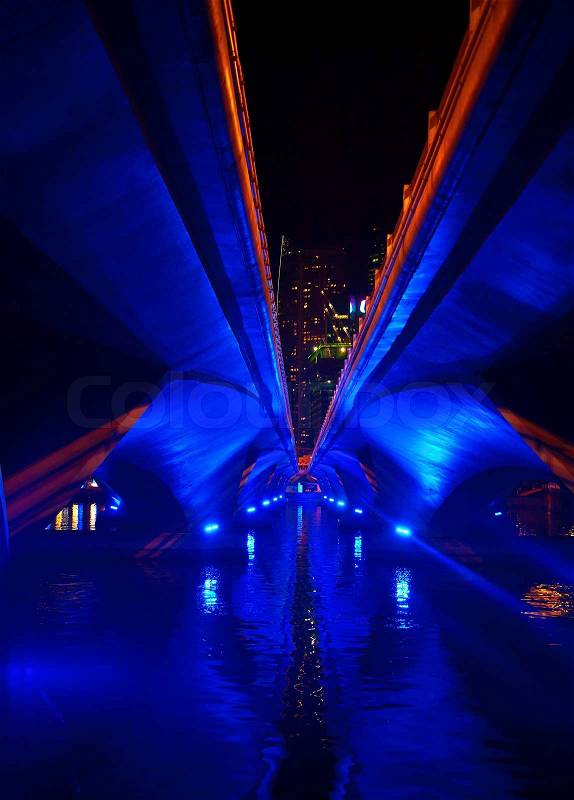 Futuristc lighting of the bridge in Singapore city, stock photo