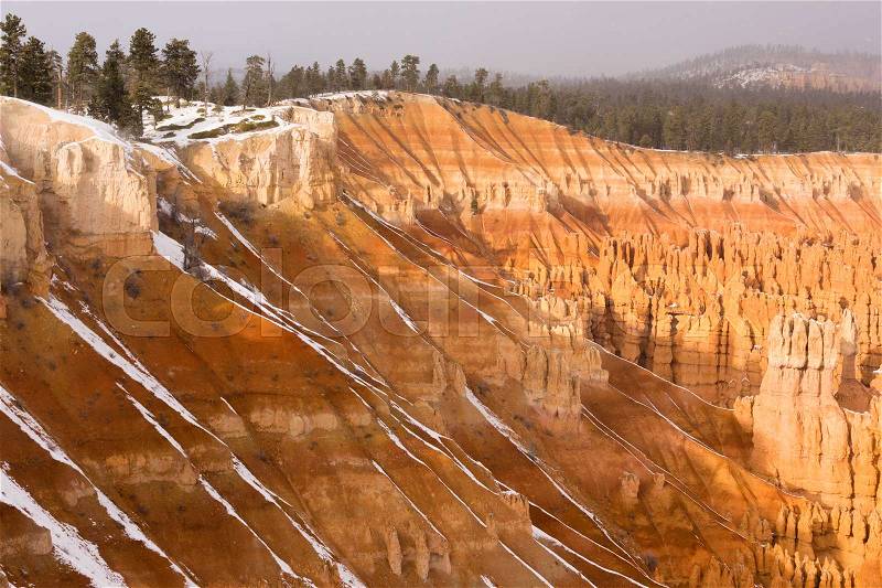 Fresh Snow Falling Bryce Canyon Rock Formations Utah USA, stock photo