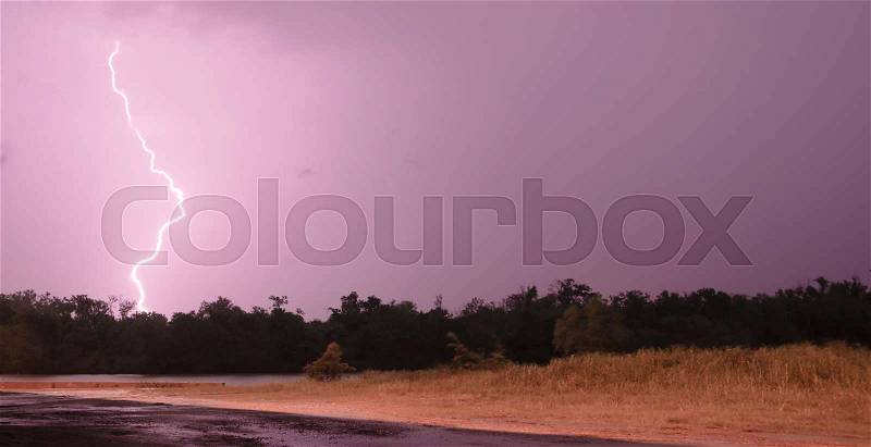 Deep South Thunderstorm Lightning Strike over River, stock photo