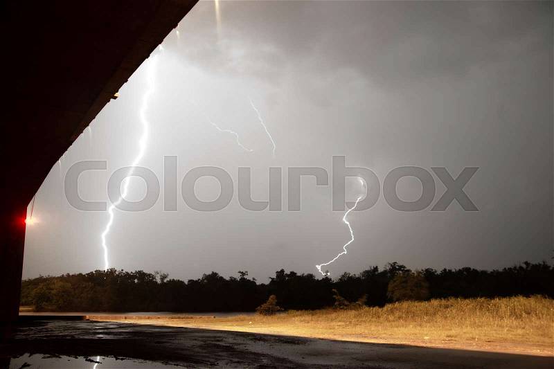 Deep South Thunderstorm Lightning Strike over River, stock photo