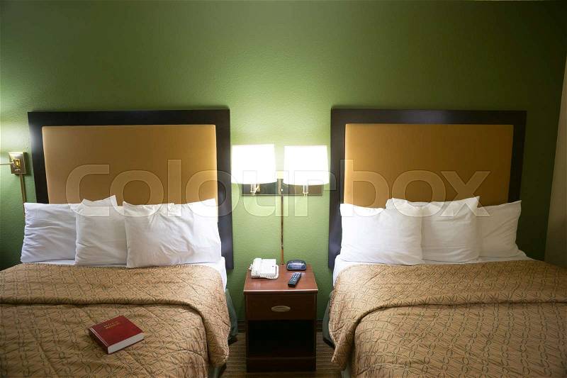 Double Queen Bed Hotel Room Travelers Motel Suite, stock photo