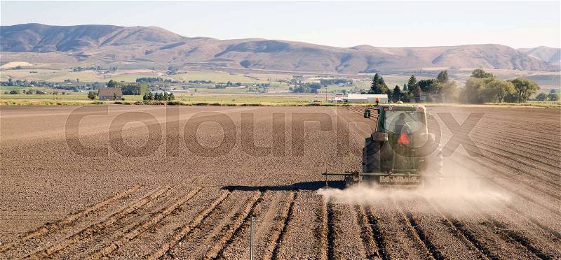 Farmer Plows Rows Fall Planting Tractor Farm Implements, stock photo