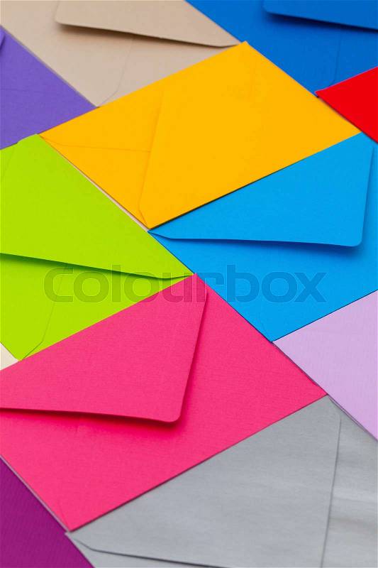 Different colored envelopes on the table, stock photo