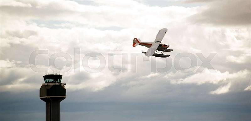 Prop Airplane Pontoon Plane Flying Airport Control Tower Last Frontier, stock photo