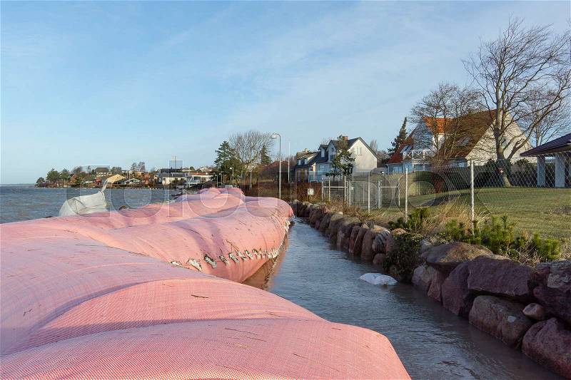 Pink water tube against the storm Urd in Frederikssund, Denmark, Dec 27, 2016,, stock photo