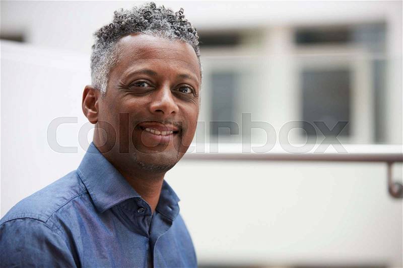 Head and shoulders portrait of a middle aged black man, stock photo