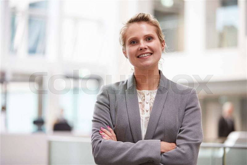 Head And Shoulders Portrait Of Businesswoman In Office, stock photo