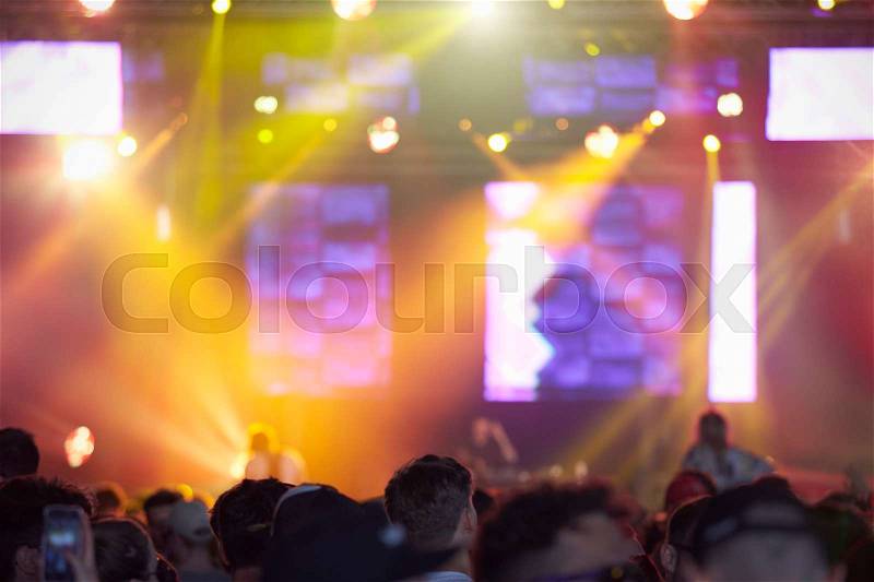 Rear View Of Audience Enjoying Music Festival, stock photo