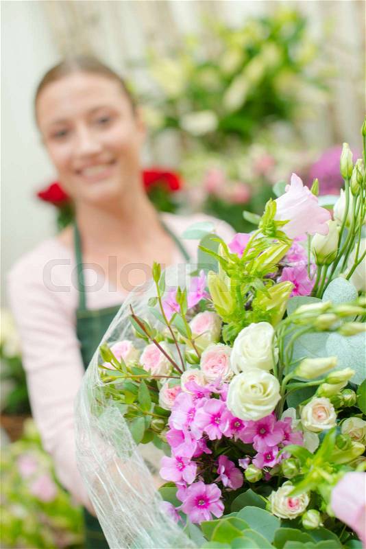 Florist and a bunch of flowers, stock photo