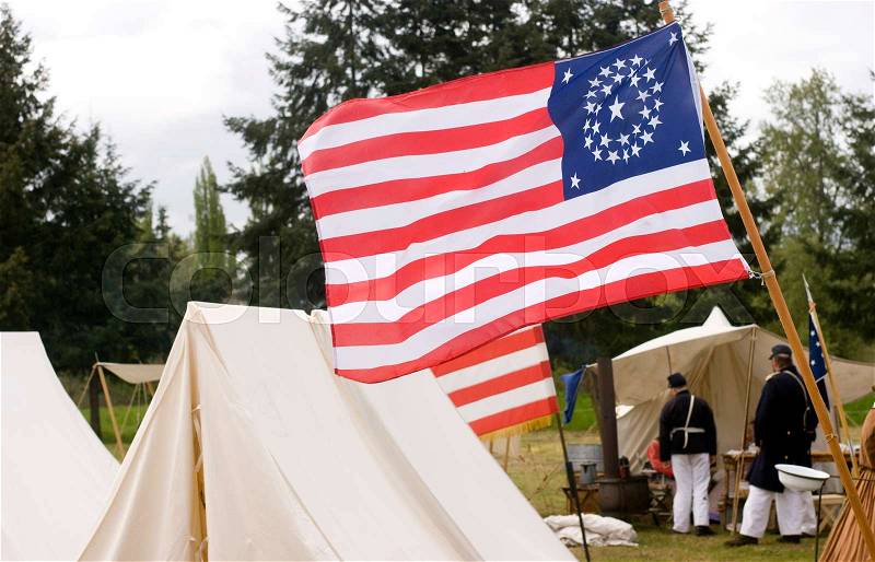 Tents and a Union Flag in the military reenactment camp, stock photo