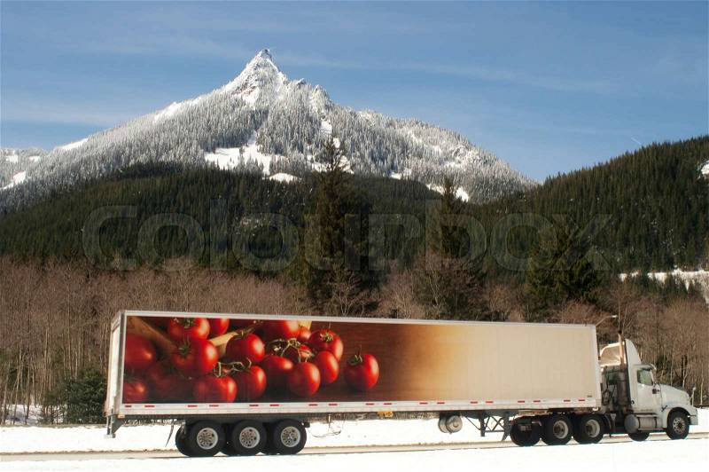 Truck Transports Foods Over Road Through North Cascades Washington State, stock photo