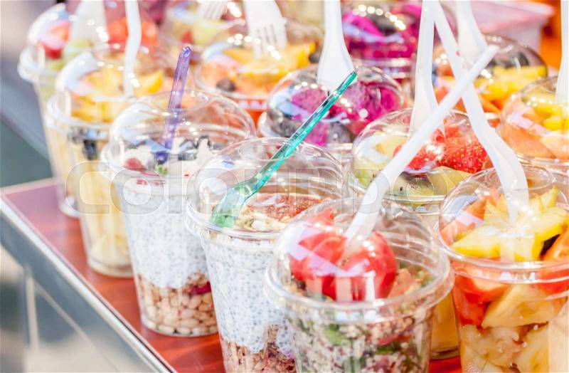 Smoothie bar with many different flavours at small market shop, stock photo