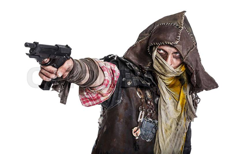 Nuclear post apocalypse life after doomsday concept. Grimy survivor with homemade weapons aiming a gun. Studio closeup portrait on white background, stock photo