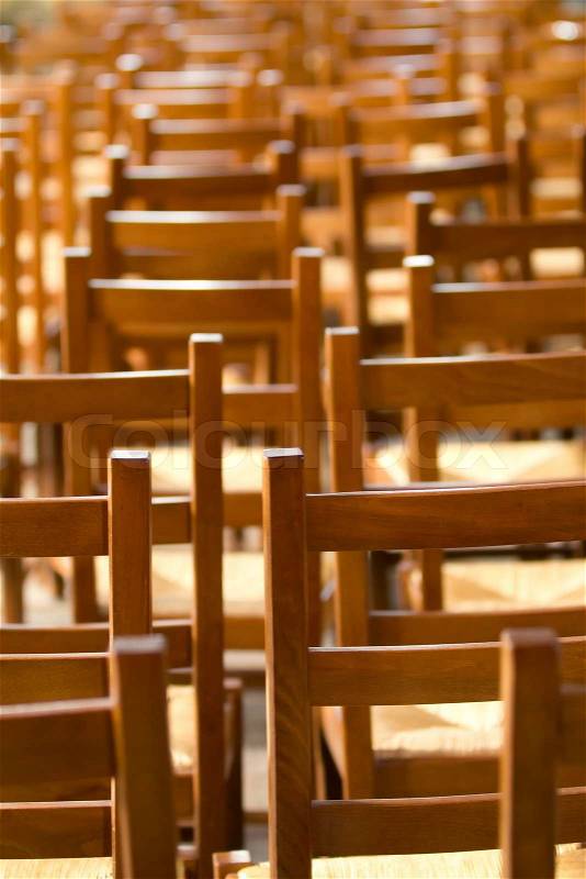 Stack of Chairs in a church, stock photo