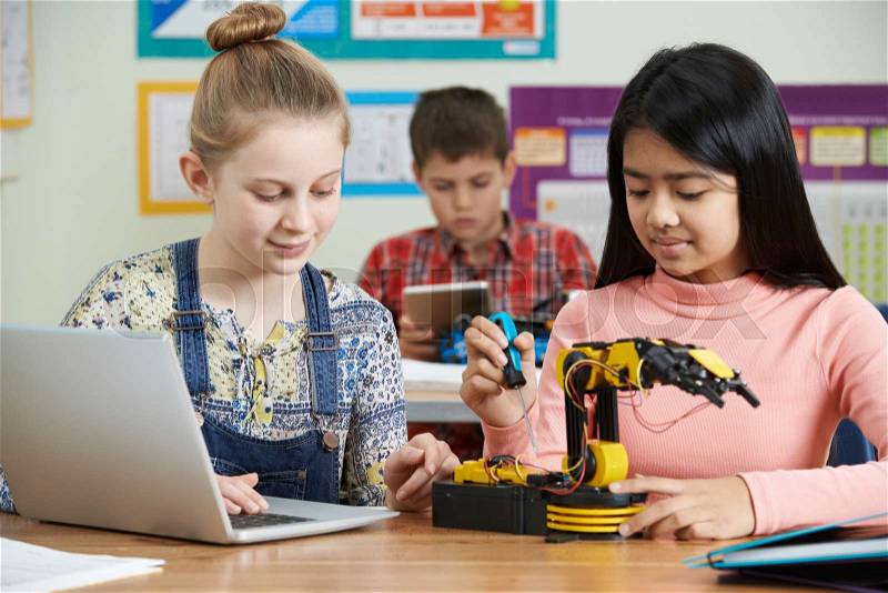 Pupils In Science Lesson Studying Robotics, stock photo