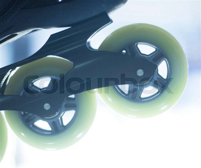Freestyle inline skates boots and wheels in retail store shop window for free, urban, slalom, fitness and recreational skating, stock photo