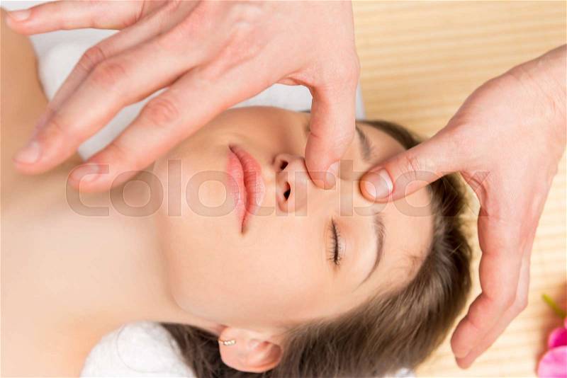 Procedure facial massage in the office beautician, stock photo