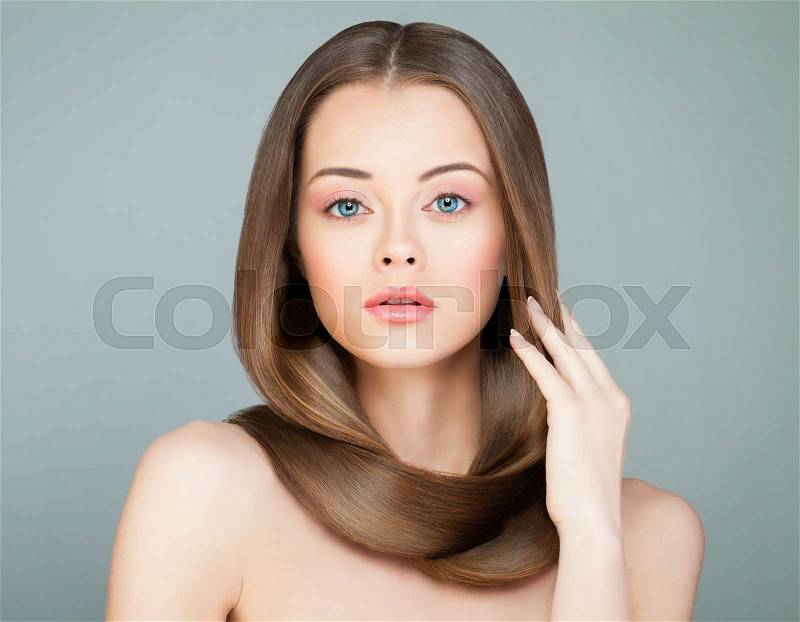 Beautiful Woman with Long Healthy Hair. Spa Model with Brown Shiny Hair, stock photo